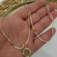 14 k altin rengi yeşil taşlı kolye