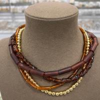 Kahve kemik model gold top detaylı çoklu kolye 